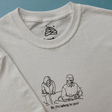 Load image into Gallery viewer, embroidered ron swanson circular desk 'parks and recreation' scene t-shirt