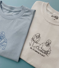 Load image into Gallery viewer, embroidered ron swanson circular desk 'parks and recreation' scene t-shirt