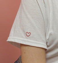 Load image into Gallery viewer, personalised hand embroidered t-shirt with heart sleeve embroidery