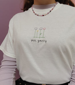 embroidered 'still growing' t-shirt