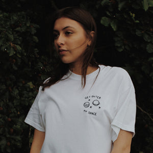 white hand embroidered 'get outer my space' t-shirt