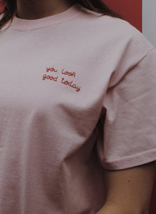 light pink hand embroidered 'you look good today' t-shirt