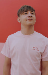 light pink hand embroidered 'you look good today' t-shirt