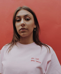 light pink hand embroidered 'you look good today' t-shirt