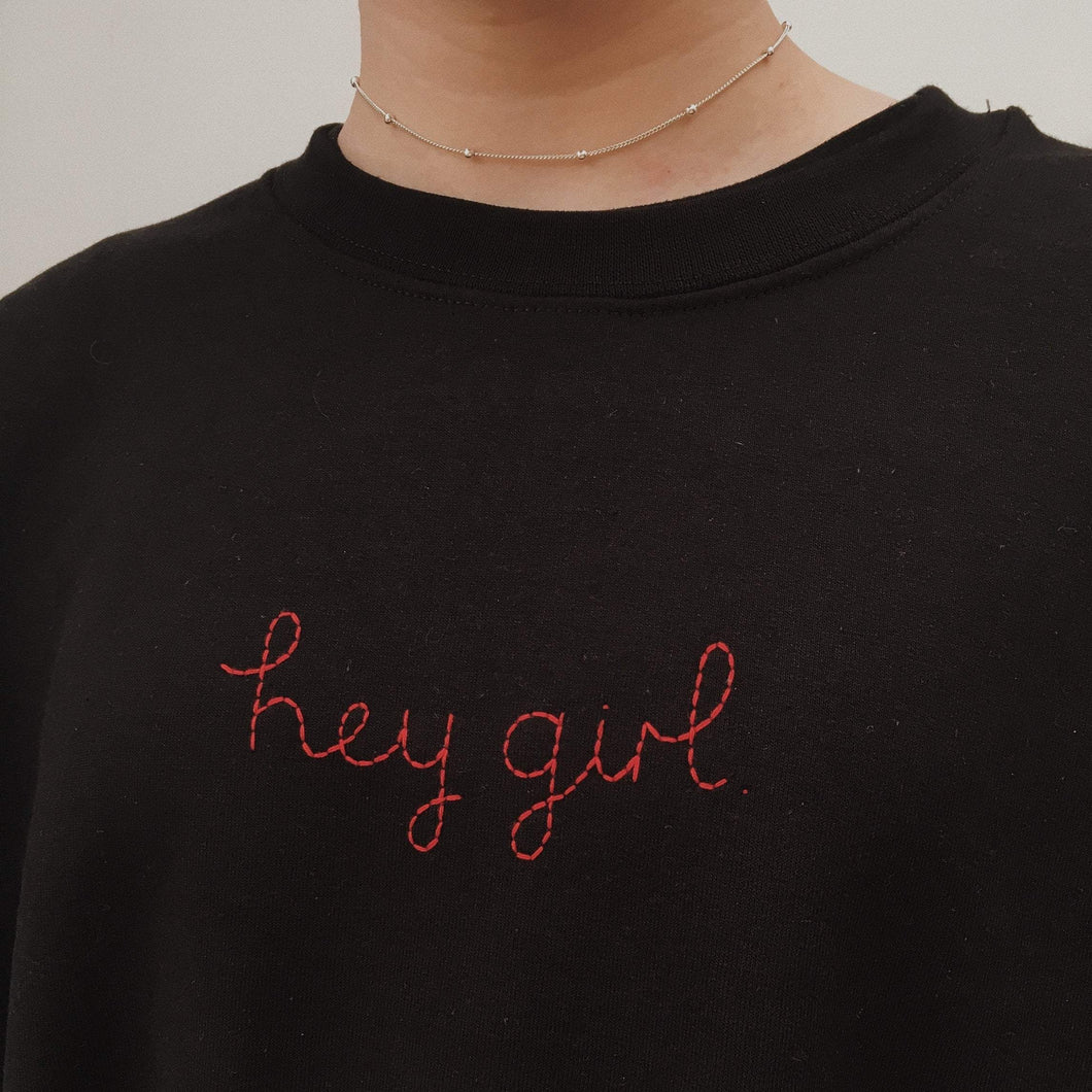 'hey girl' hand embroidered crew neck jumper